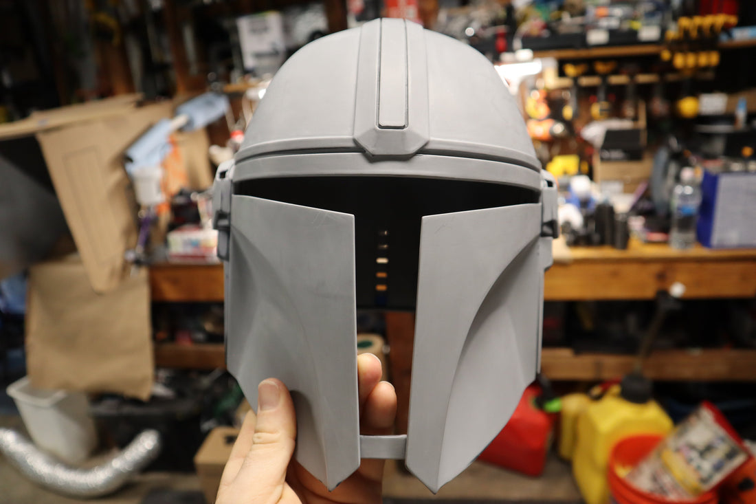 Completed smoothing stage: the guide coat has been fully removed, leaving a uniform matte primer surface ready for paint.